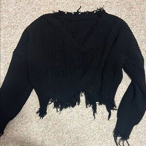 Black distressed long sleeve top